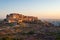 Cityscape at Jodhpur at dusk. The majestic fort perched on top dominating the blue town. Scenic travel destination and famous tour