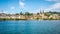 Cityscape of Lucerne skyline taken from the lake with Wilhelm tell touristic boat and Church of St. Leodegar in Lucerne