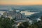 Cityscape Malaga by sunset with bulls arena and trees