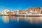 Cityscape of Malmo with historic and modern architecture, embankment and ship, long exposure photo