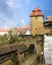 Cityscape of the medieval town gate and gates tower.