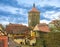 Cityscape of the medieval town with gates tower.