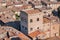 Cityscape of medieval town of Tuscany with brick towers and old houses. Italian province