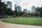 Cityscape near Petronas twin towers park`s pool in Kuala Lumpur, Malaysia