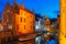 Cityscape with the night canal Dijver in Bruges