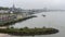 Cityscape of Nijmegen with a groyne in front