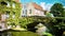 Cityscape with old bridge and typical Flemish houses. Bruges, Belgium.