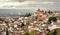 Cityscape with old houses of Granada under rainy clouds. Landscape of historical town of Andalusia, Spain