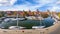 Cityscape of the old town of the Hanseatic city Stralsund with boats in a small harbour on a sunny