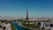 Cityscape of Paris. Aerial drone view of Eiffel tower in sunny day. Wide shot