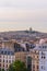 Cityscape of Parisian rooftops and Sacre-Coeur minor basilica from Centre Pompidou. Sacred Heart church in Montmartre hill.