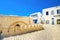 Cityscape with part of fortress wall and narrow street in Sousse. Tunisia, North Africa