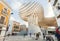 Cityscape with pedestrians under Metropol Parasol, urban project in the form of giant mushrooms