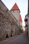 Cityscape picture taken in the Old Town of Tallinn, Estonia. Houses with red roof at old part of the city. Ancient landmark of