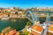 Cityscape of Porto. View of the Dom Luis I Bridge Ponte de Dom LuÃ­s I and the River Douro. View from Vila Nova De Gaia, Portugal