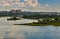 Cityscape with river and clouds