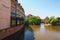 Cityscape from river Pegnitz in Nurnberg, with living houses on shore in Bavarian town