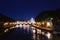 Cityscape romantic night view of Roma. Panorama with Saint Peter\\\'s basilica and Saint Angelo castle and bridge.