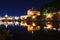 Cityscape romantic night view of Roma. Panorama with Saint Peter\'s basilica and Saint Angelo castle and bridge. Famous tourist