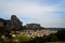 Cityscape scenic view of Kalambaka ancient town with beautiful rock formation mountain, immense natural boulders pillars and sky