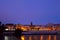 Cityscape of Seville by river in dusk
