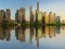 Cityscape of Shanghai and Huangpu River on sunset, beautiful reflection on skyscrapers, China