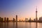 Cityscape of Shanghai at sunrise. Panoramic view of Pudong business district skyline from the Bund