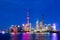 Cityscape of Shanghai at twilight sunset. Panoramic view of Pudong business district skyline from the Bund