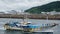 Cityscape - ships in the port of the South Korean island and Jeju city