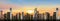 Cityscape with sunset sky background,Dramatic sunrise over the City,Twilight skyline landscape with yellow, orange and blue sky in