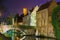 Cityscape with a tower Belfort and the Green canal