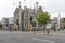 Cityscape with traditional stone Victorian house on urban crossroad, Christchurch, New Zealand