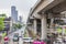 Cityscape traffic and rain at Makkasan station in Bangkok Thailand