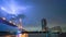 Cityscape urban bridge at night chao phraya river and lightning  thunder background