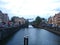 Cityscape view with canal, bridges, streets and traditional Dutch houses in Amsterdam, Netherlands