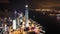 Cityscape view of Hong Kong island, drone aerial night hyperlapse time lapse. Skyscraper buildings in financial district