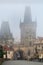 Cityscape - view of the MalÐ° Strana Bridge Tower from the Charles Bridge in the early morning, Prague