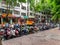 Cityscape view of old residential building and bike parking in Sanya city on Hainan island, China