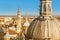 cityscape view on the roofs and spires of basilica of Our Lady del Pilar at sunset in Zaragoza city in Spain