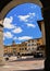 Cityscape view under arch on the street in old historic alley in the medieval village of Anghiari near city of Arezzo