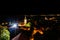 Cityscape of Zemun and St. Nicholas church at night.