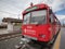 Ciudad de Mendoza, Mendoza / Argentina, December 12 2018: Daily activity of a red train full of passengers traveling through the
