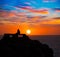 Ciutadella Menorca at Punta Nati sunset with girl