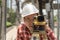 Civil engineer land survey with tacheometer or theodolite equipment..worker Checking construction site on