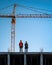 Civil engineers supervising the construction of the building