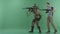 Civilian with rifle caughts man in military uniform with a weapon against chromakey background