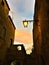 Civita di Bagnoregio, province of Viterbo, Italy. Ancient town corner, lamp and sunset