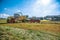 Claas harvester and a Fendt 926 with a Krone ZX400GL trailer works on a field