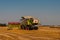 Claas harvester on a grain field