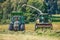 Claas Jaguar 930 harvester and a Fendt 926 with a Krone ZX400GL trailer works on a field